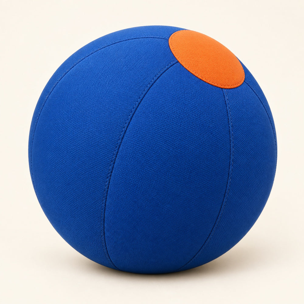 Blue textile-covered inflatable ball with an orange cap
